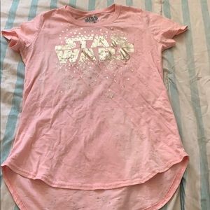 Girls t-shirt with Star Wars logo on it